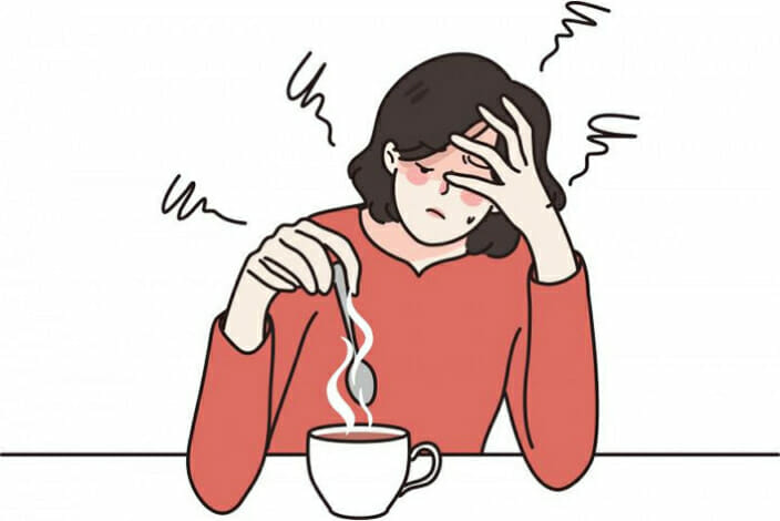 علاقة الكافيين بين القهوة والصداع